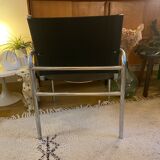 Tubular armchair and vintage skaï