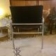 Tubular armchair and vintage skaï