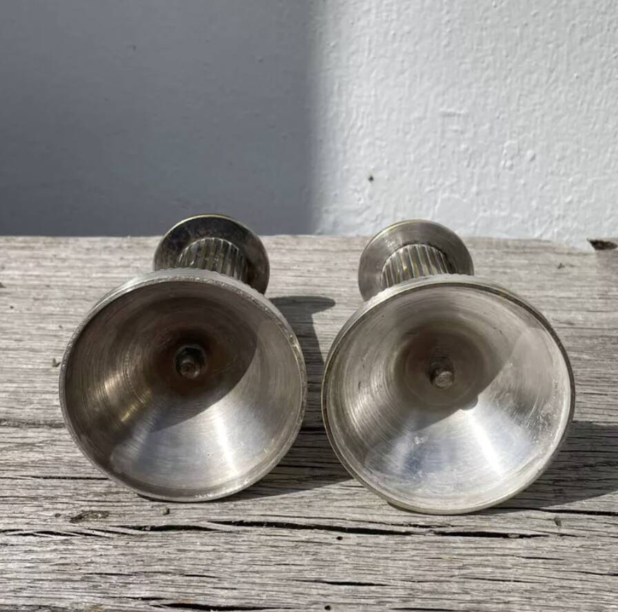 Pair of 19th-century fluted silver-plated metal candlesticks