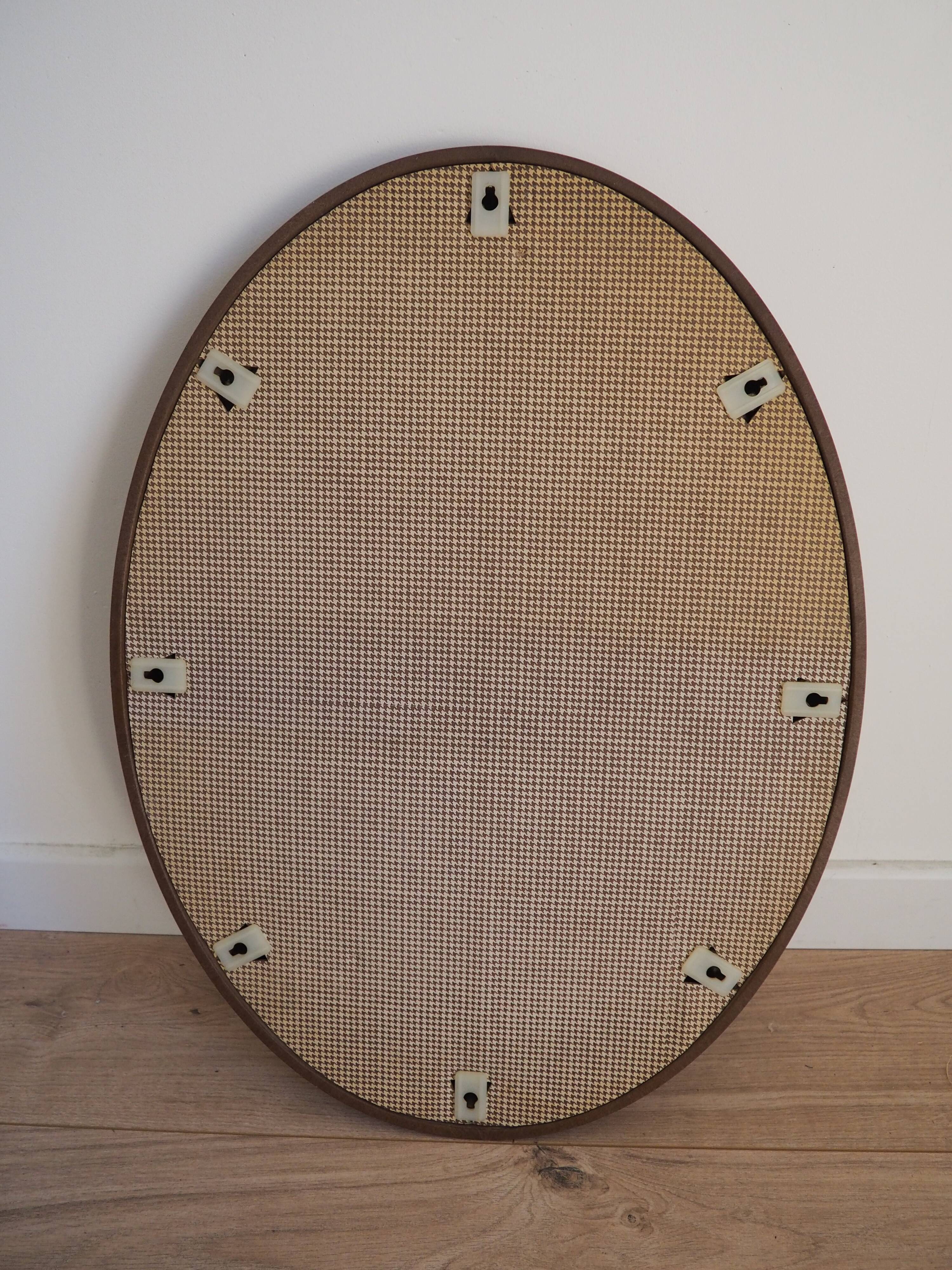 Vintage oval mirror with wooden frame