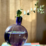 Purple vase inclined