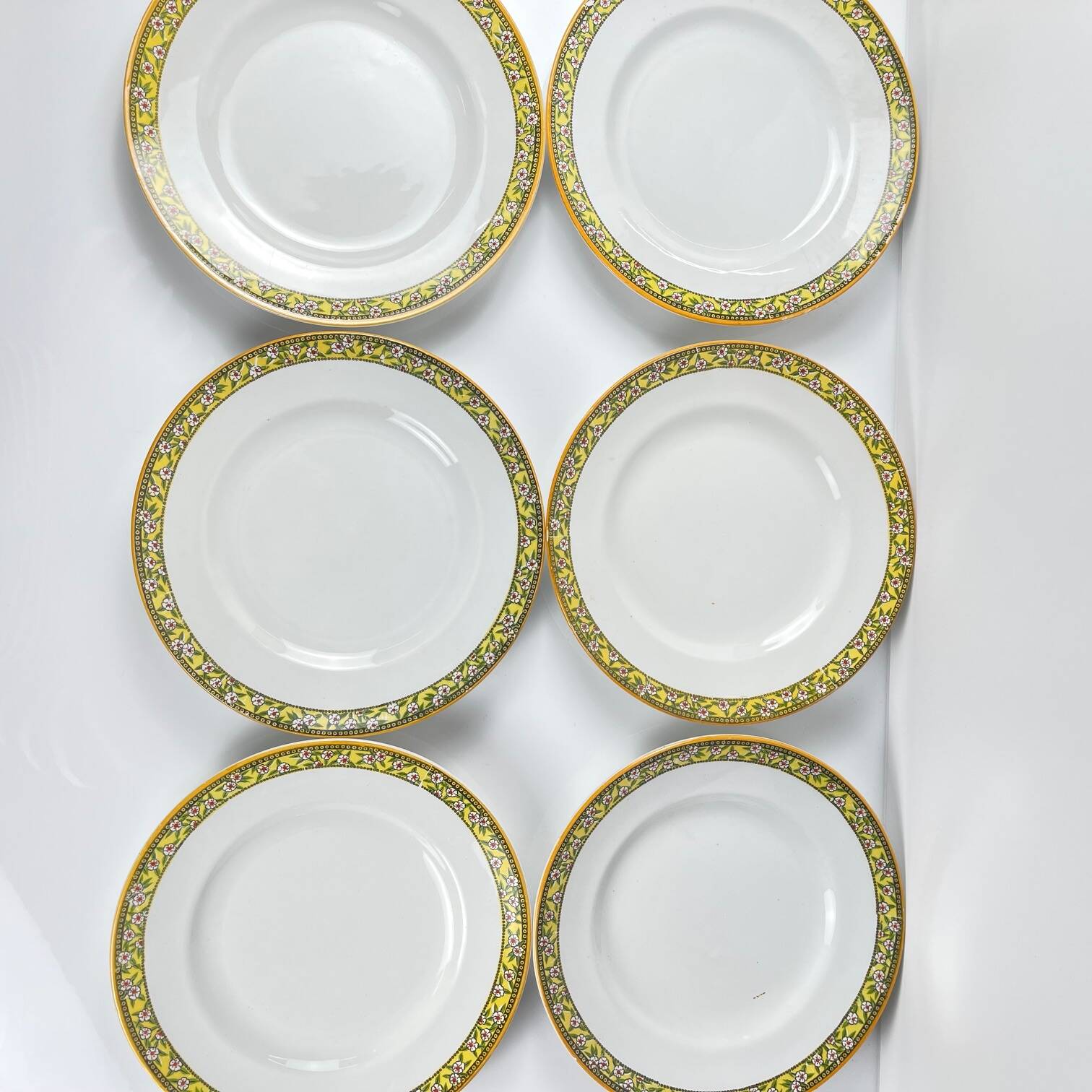 Set of 6 "Yvonne" iron earth plates, Orchies, early 20th century