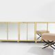 Brass sideboard with mirror and plexiglass legs by Michel Pigneres, 1970