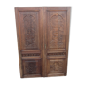 Paire de portes anciennes en bois sculptées