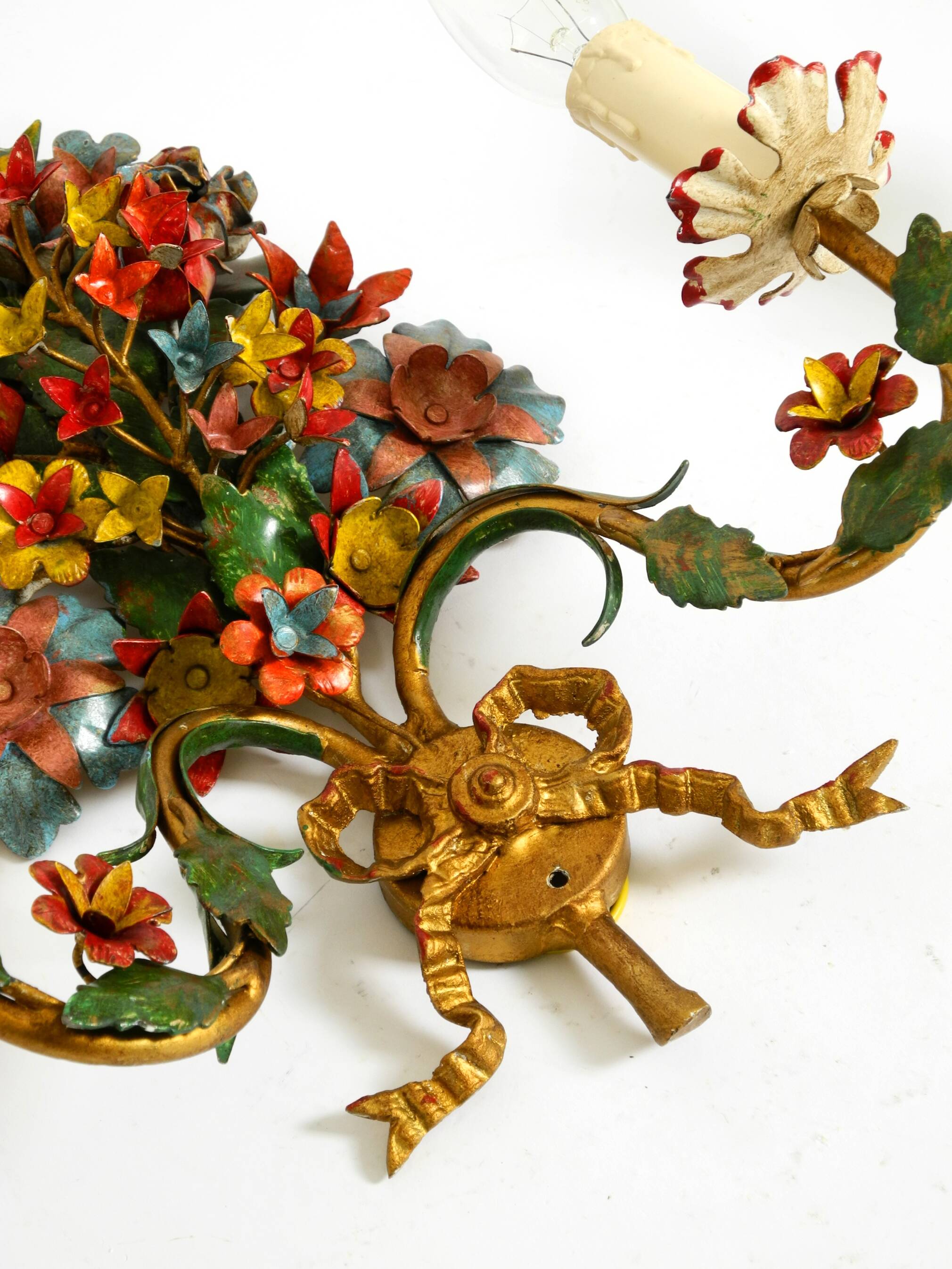 A pair of beautiful 1960s hand-painted and gilded metal wall lamps by Hans