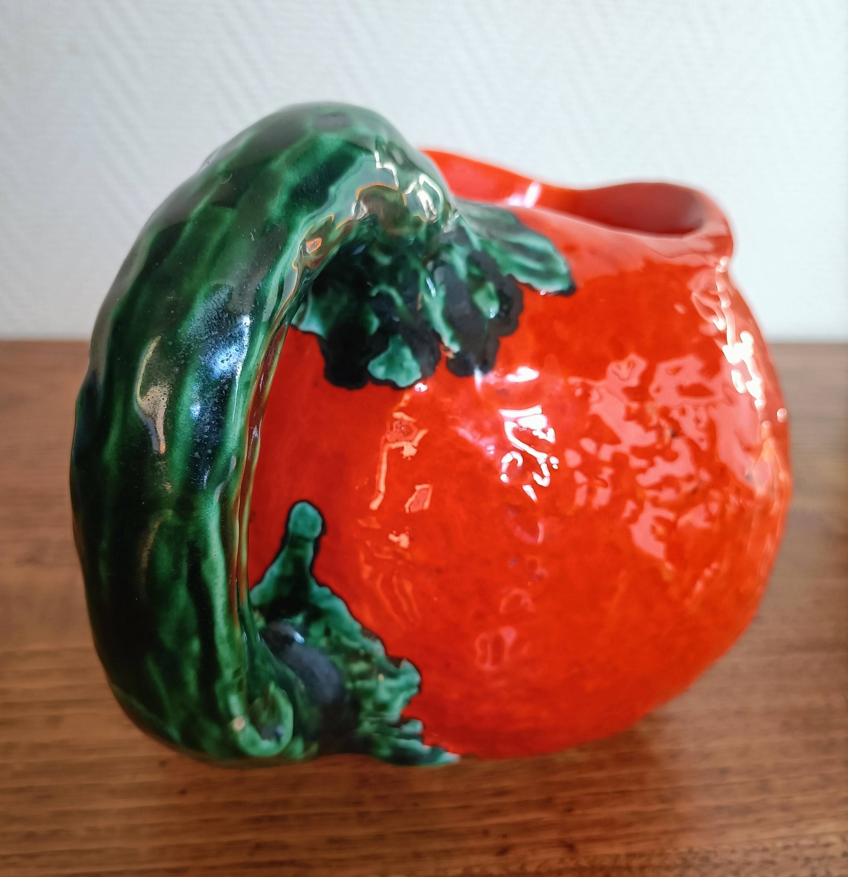 Orange pitcher in Corsican slip