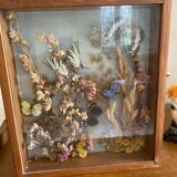 Vintage frame with butterflies and dried flowers