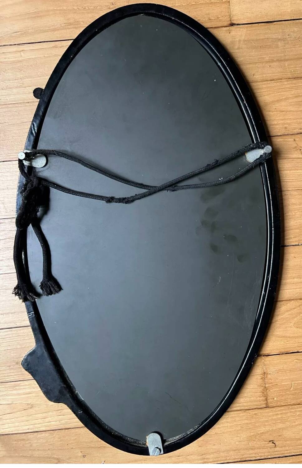 Oval cast steel mirror with Art Nouveau decor