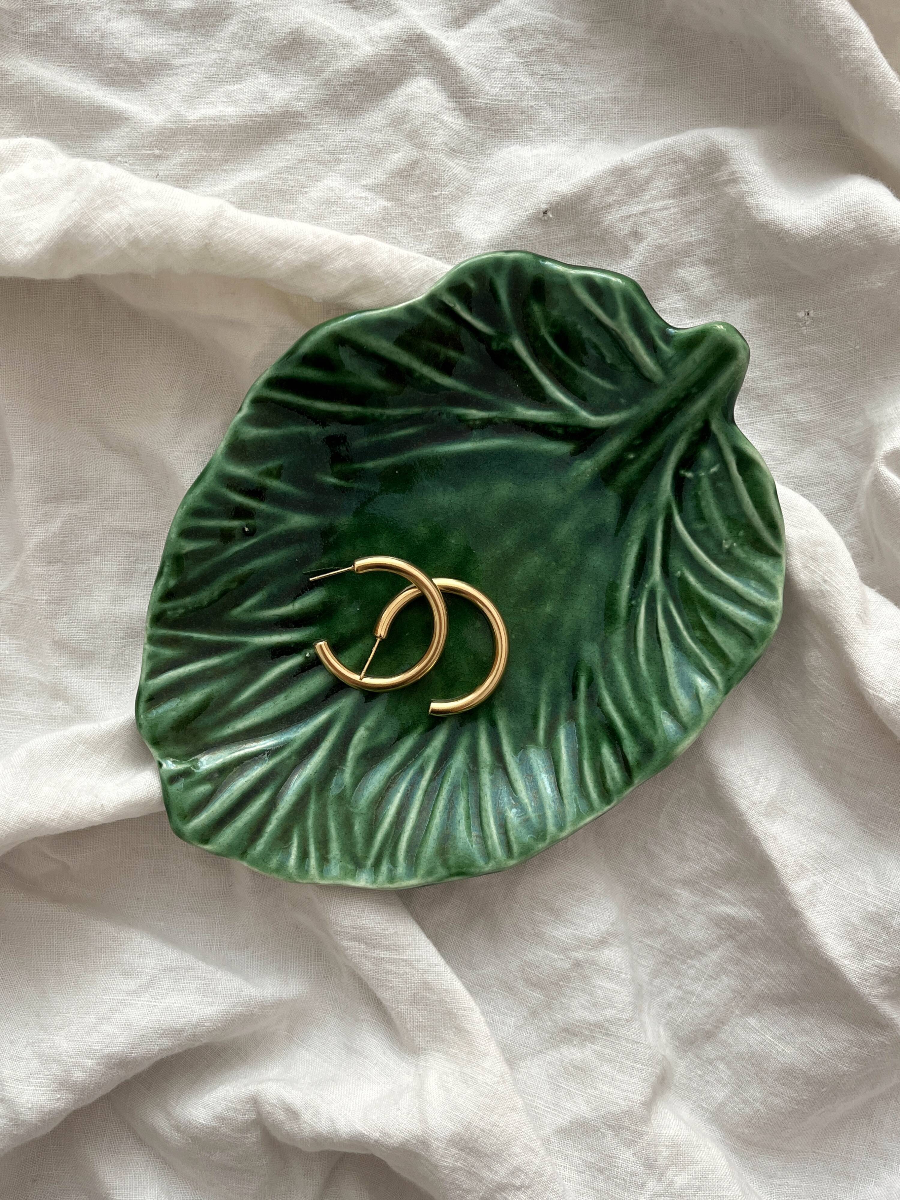 Small empty pocket dish in vintage slip leaf
