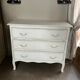 Chest of drawers with 3 curved legs