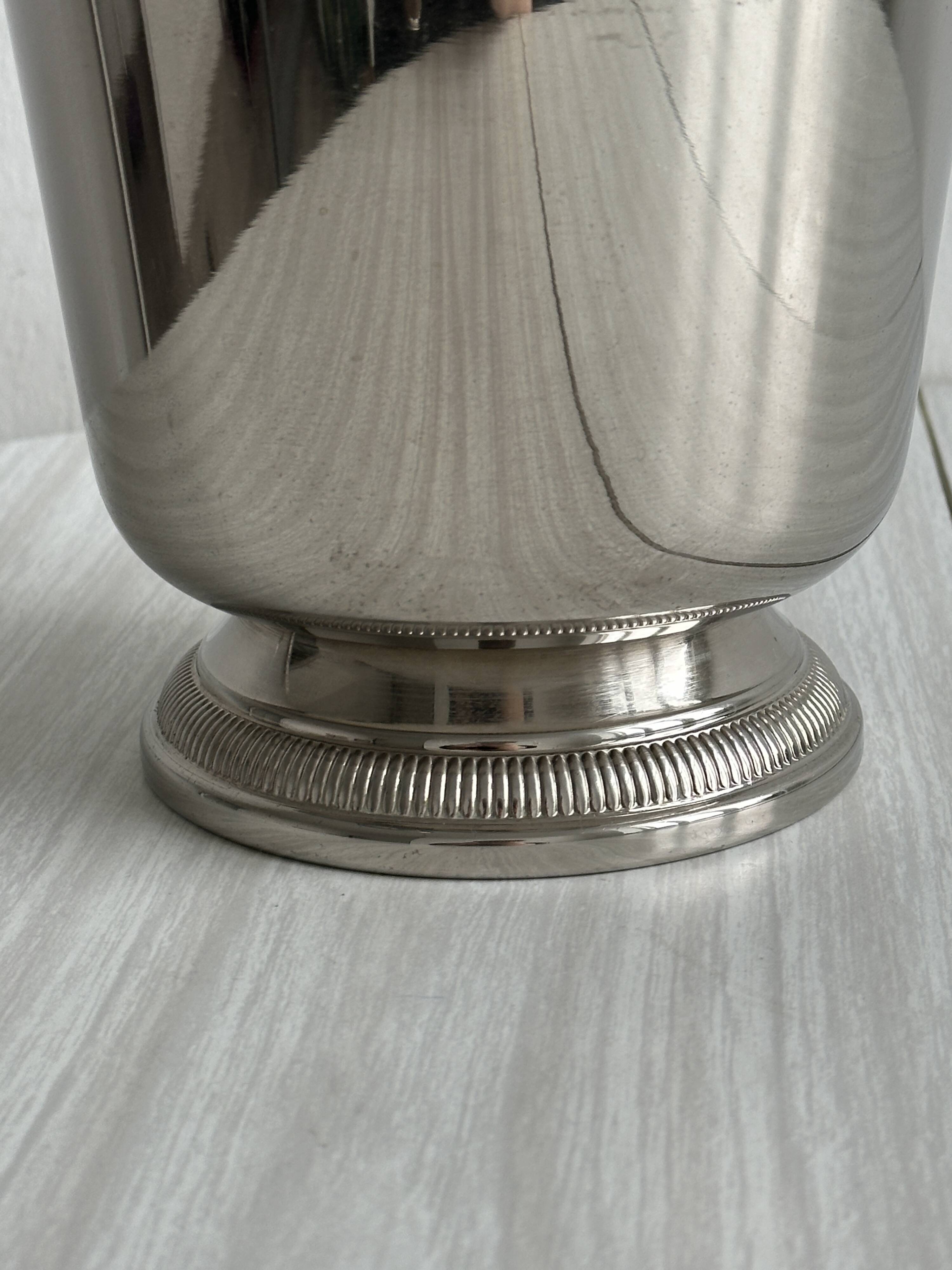 Shiny metal champagne bucket