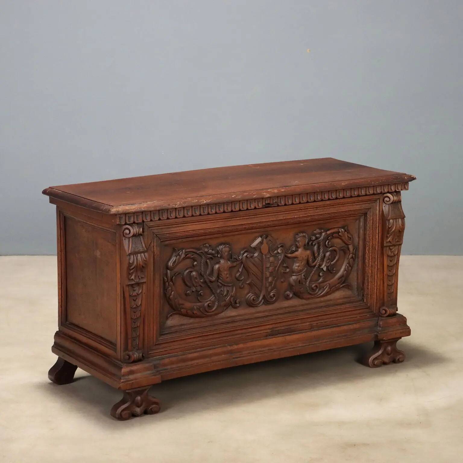 Walnut chest with baroque carvings