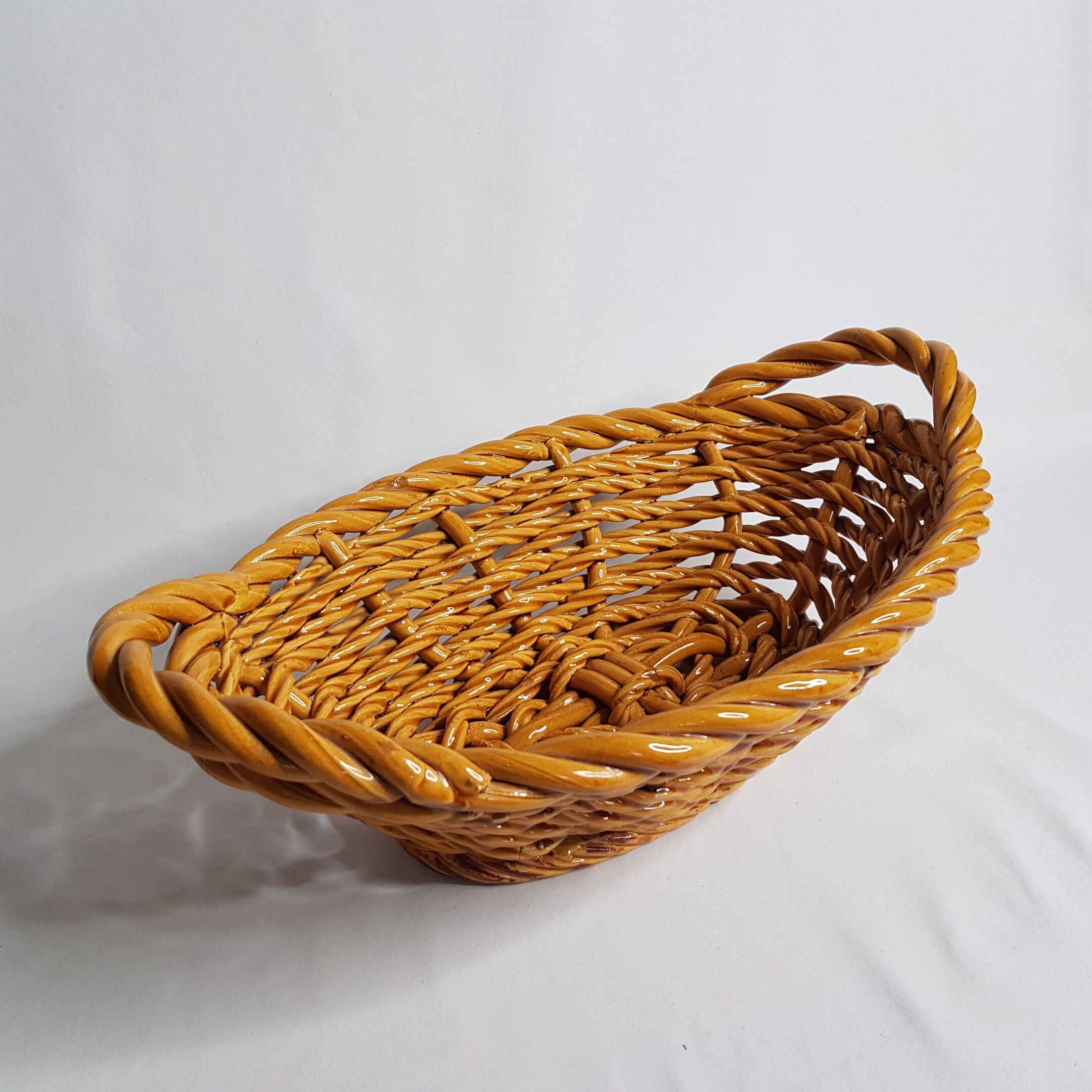 Fruit basket in golden yellow braided dab