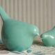 Set of 2 stylized glazed ceramic birds