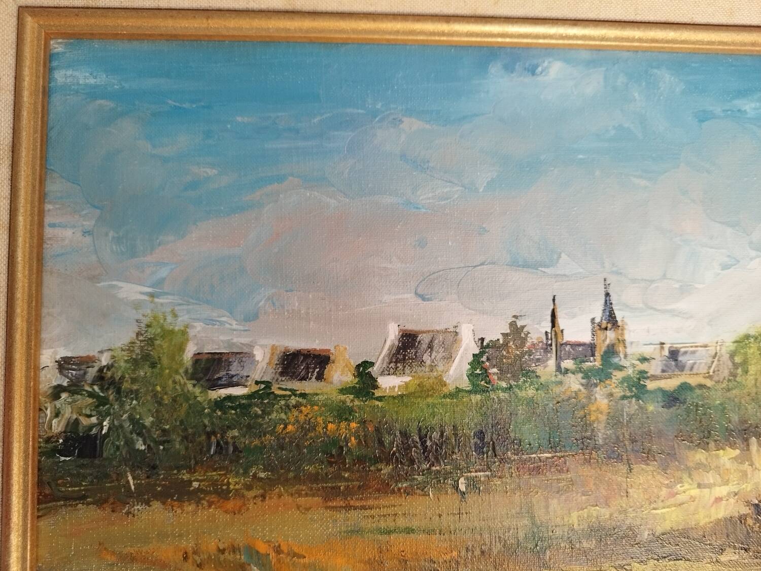 Oil on canvas "a Village in Brittany" signed by Raymond Scuiller