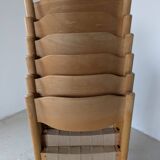 Set of 6 stackable chairs in beech and jute.