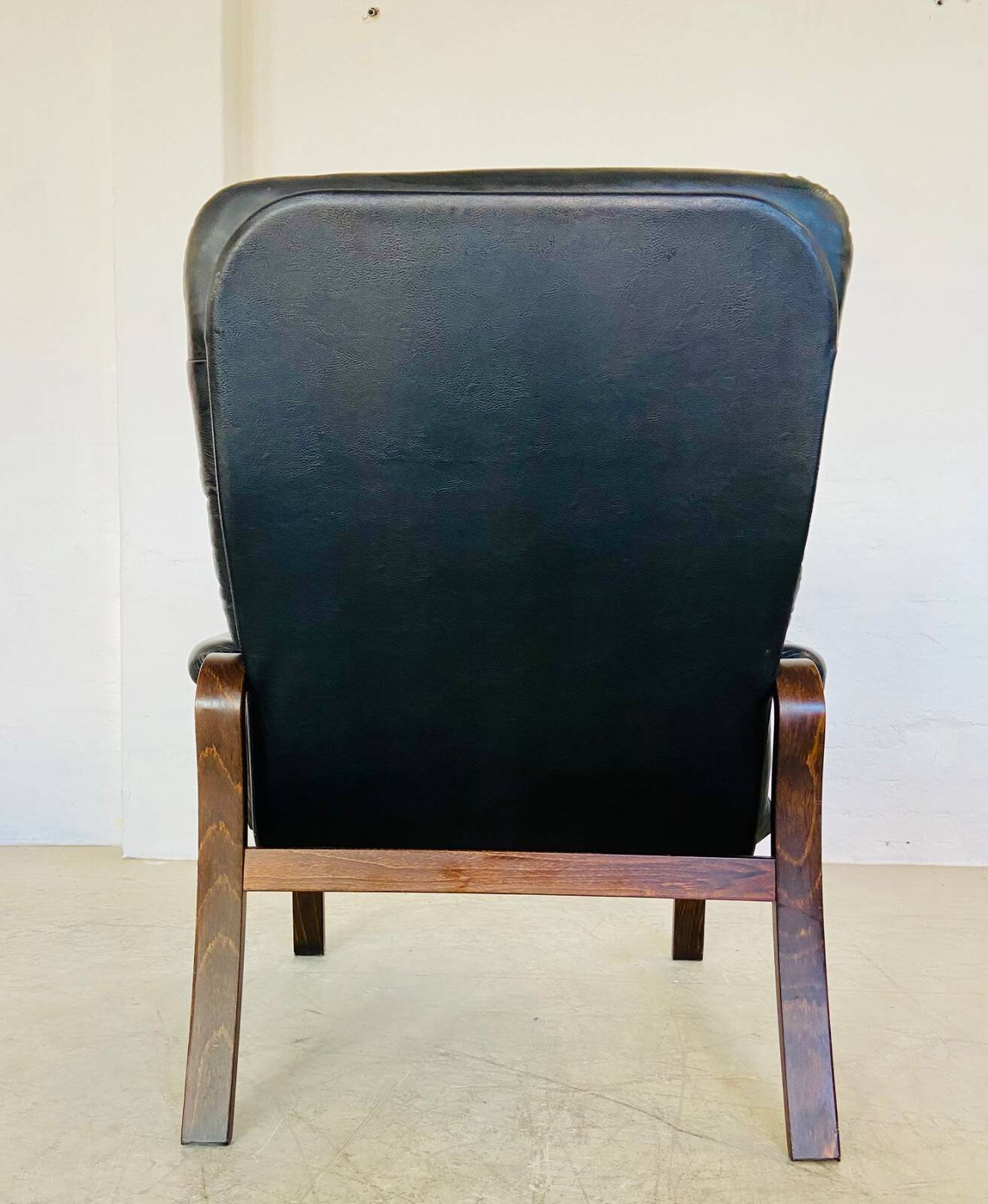 Vintage mid-century Scandinavian black leather lounge chair 1970s