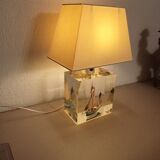 Boat lamp integrated into the base