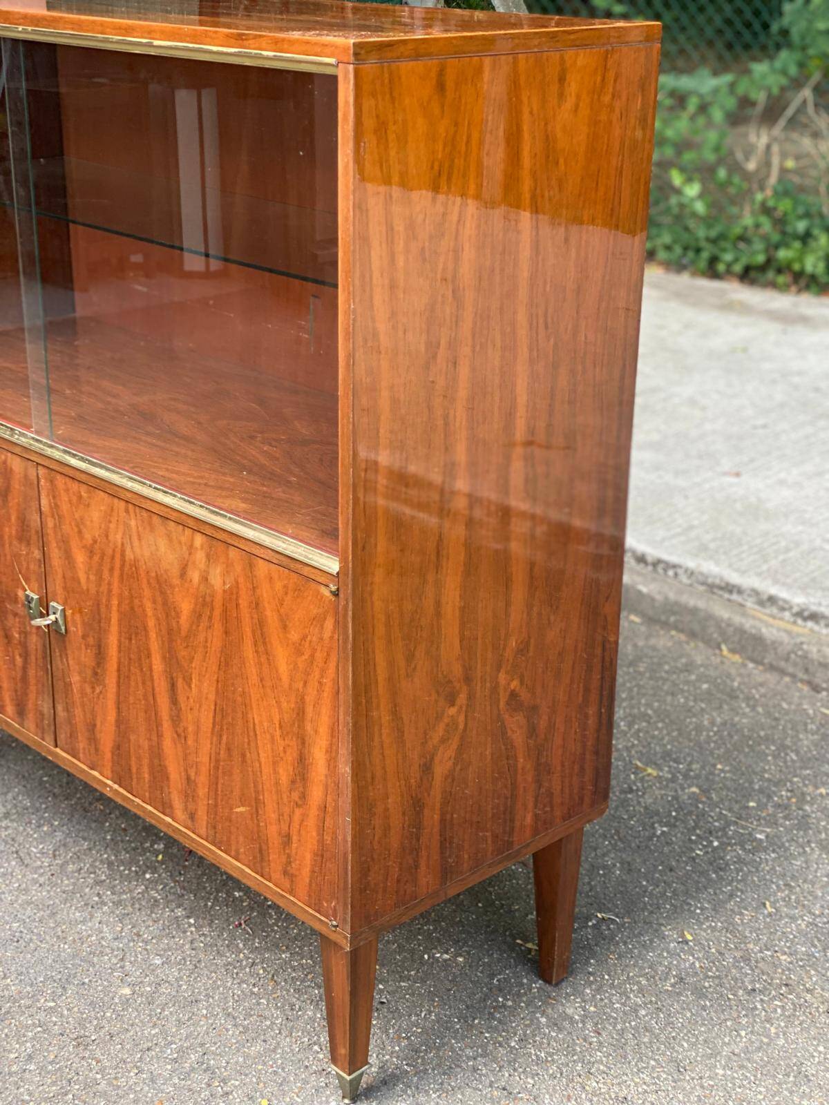 Scandinavian high buffet display cabinet in rosewood from the 1950s.