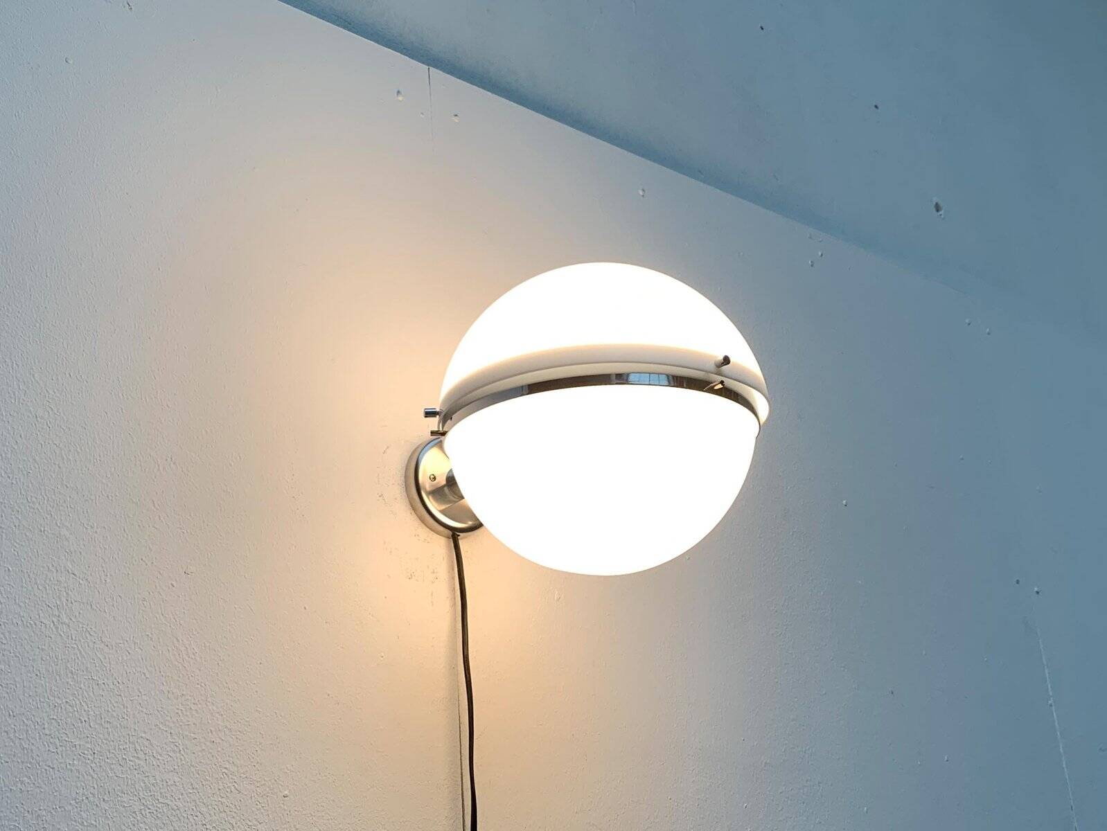 Mid-century Italian space age spherical wall light by Guzzini.