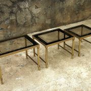 Brass, gold metal and 70s mirror glass tables