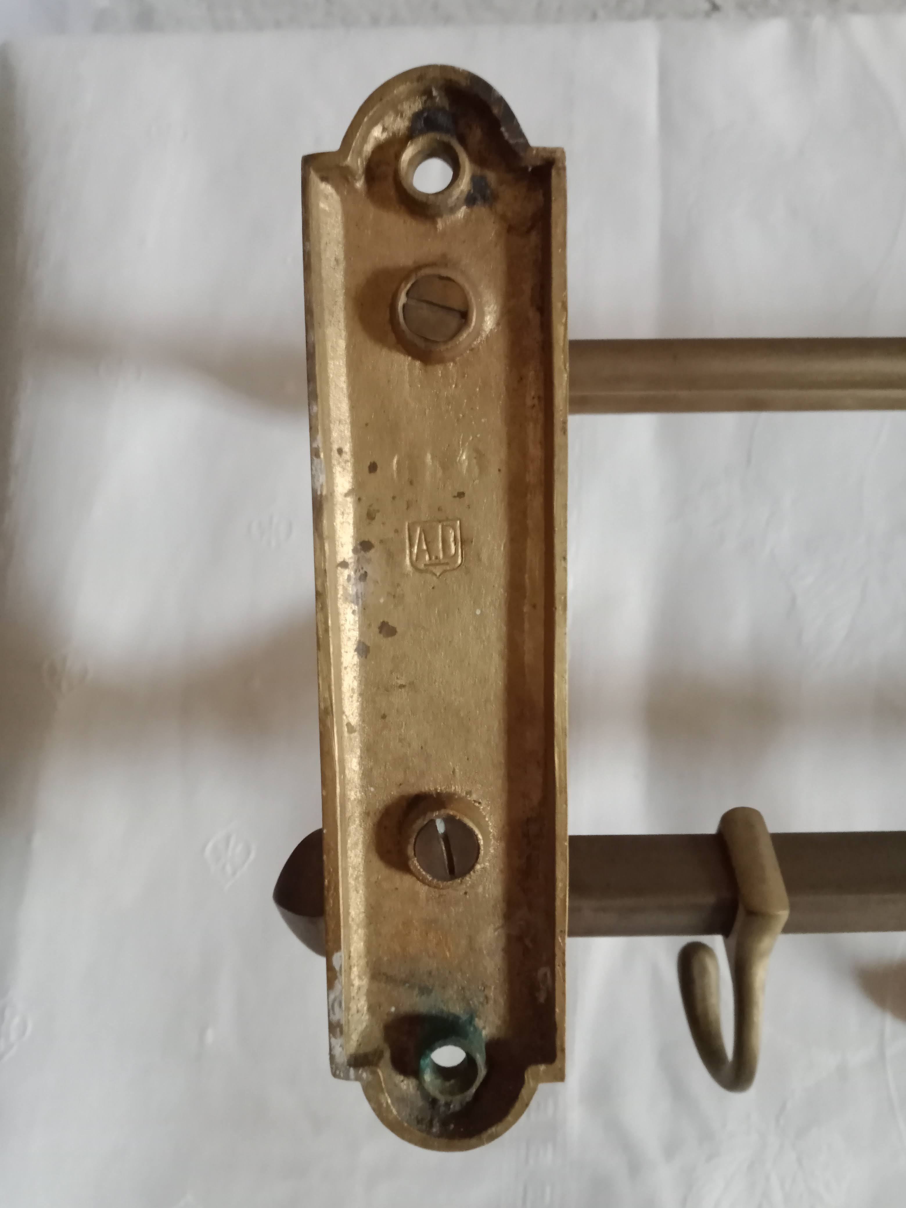 old brass wall coat rack