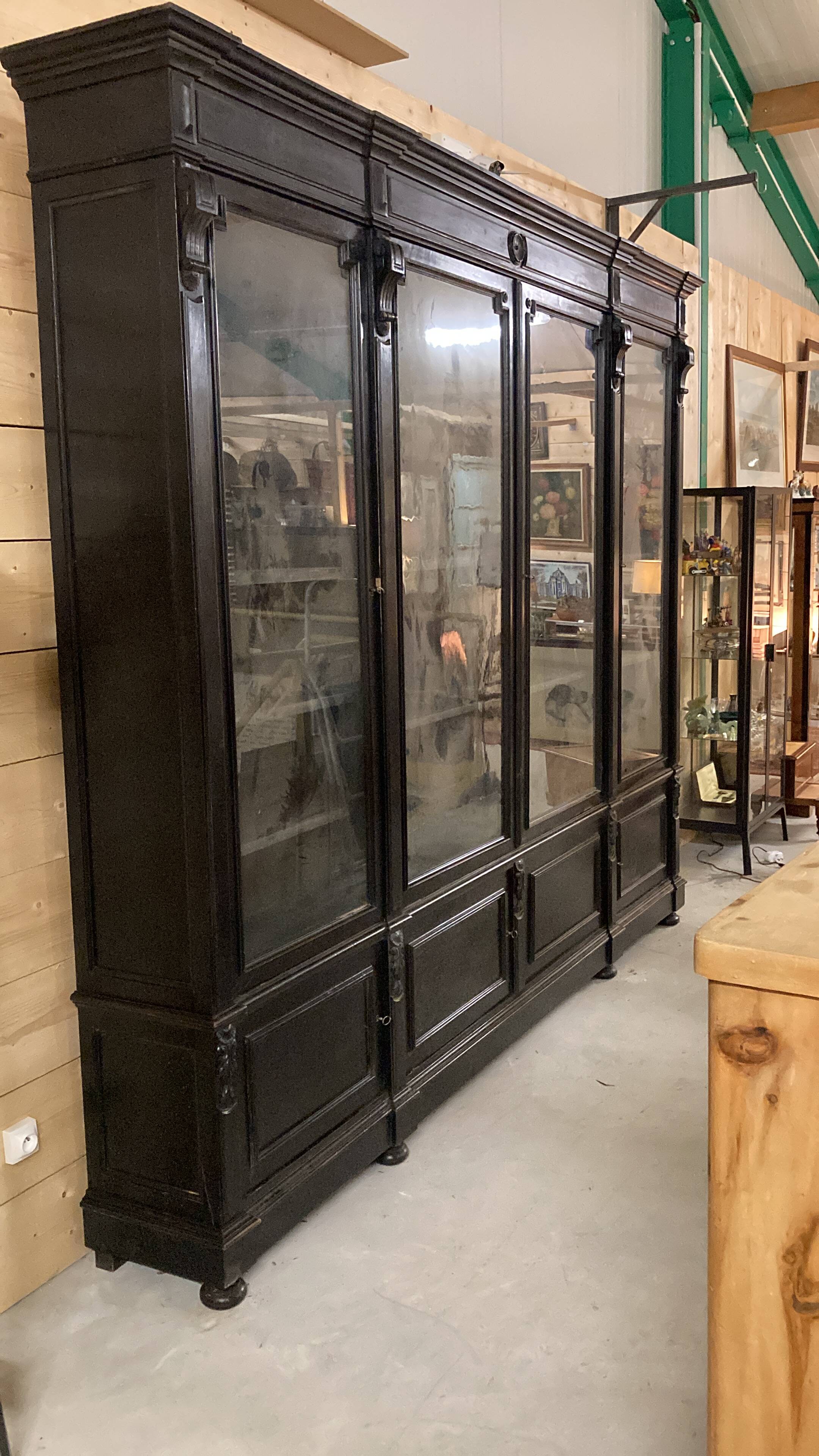 Library from the Napoléon III era in blackened pear wood.
