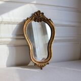 Small golden mirror in baroque style