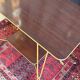 Vintage 1960s rolling dessert trolley in gold metal and formica.