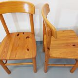 Suite of a round table with extension and 4 vintage pine chairs from the 60s and 70s
