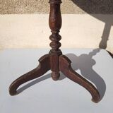Small rustic antique tripod side table made of solid wood.