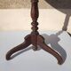 Small rustic antique tripod side table made of solid wood.