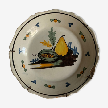 Plate of Nevers in earthenware late eighteenth century decoration with pear