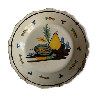 Plate of Nevers in earthenware late eighteenth century decoration with pear