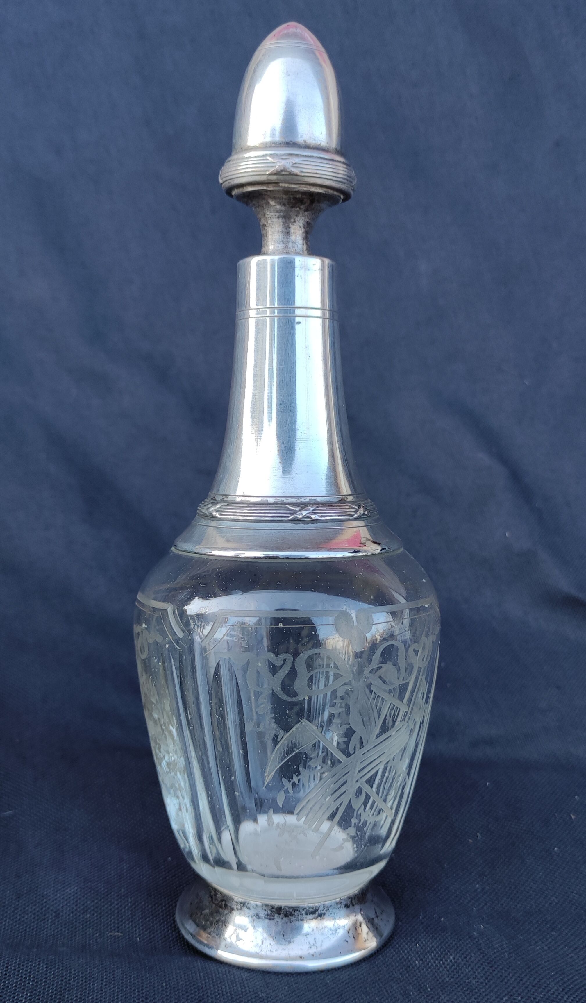 Old silver metal carafon
