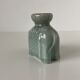 Porcelain candle holder and celadon cover in the shape of an elephant