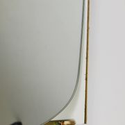 Mid-century illuminated wall mirror by Ernest Igl with brass crown, by Hillebrand.