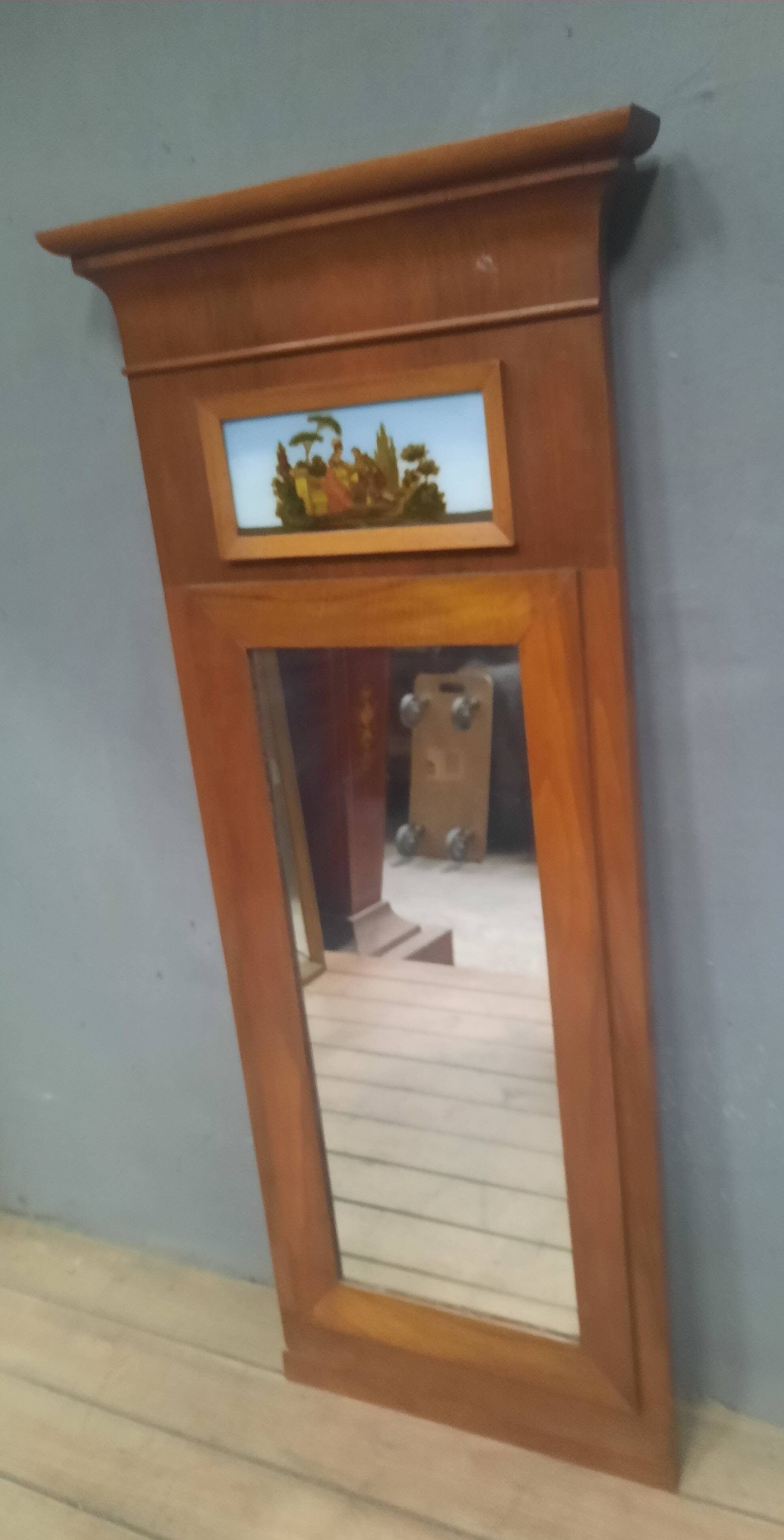 Small varnished wooden trumeau with a gallant scene motif