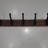 Vintage wooden coat rack with 5 double cast iron hooks