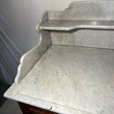 Antique wood and marble kitchen sideboard with carved backsplash