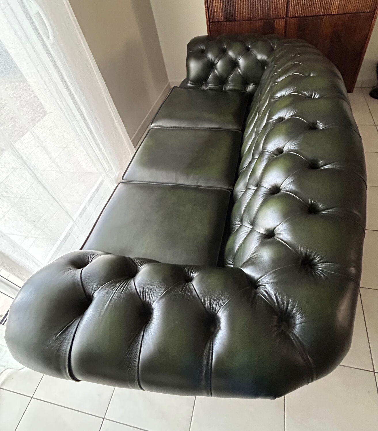 three-seater Chesterfield sofa