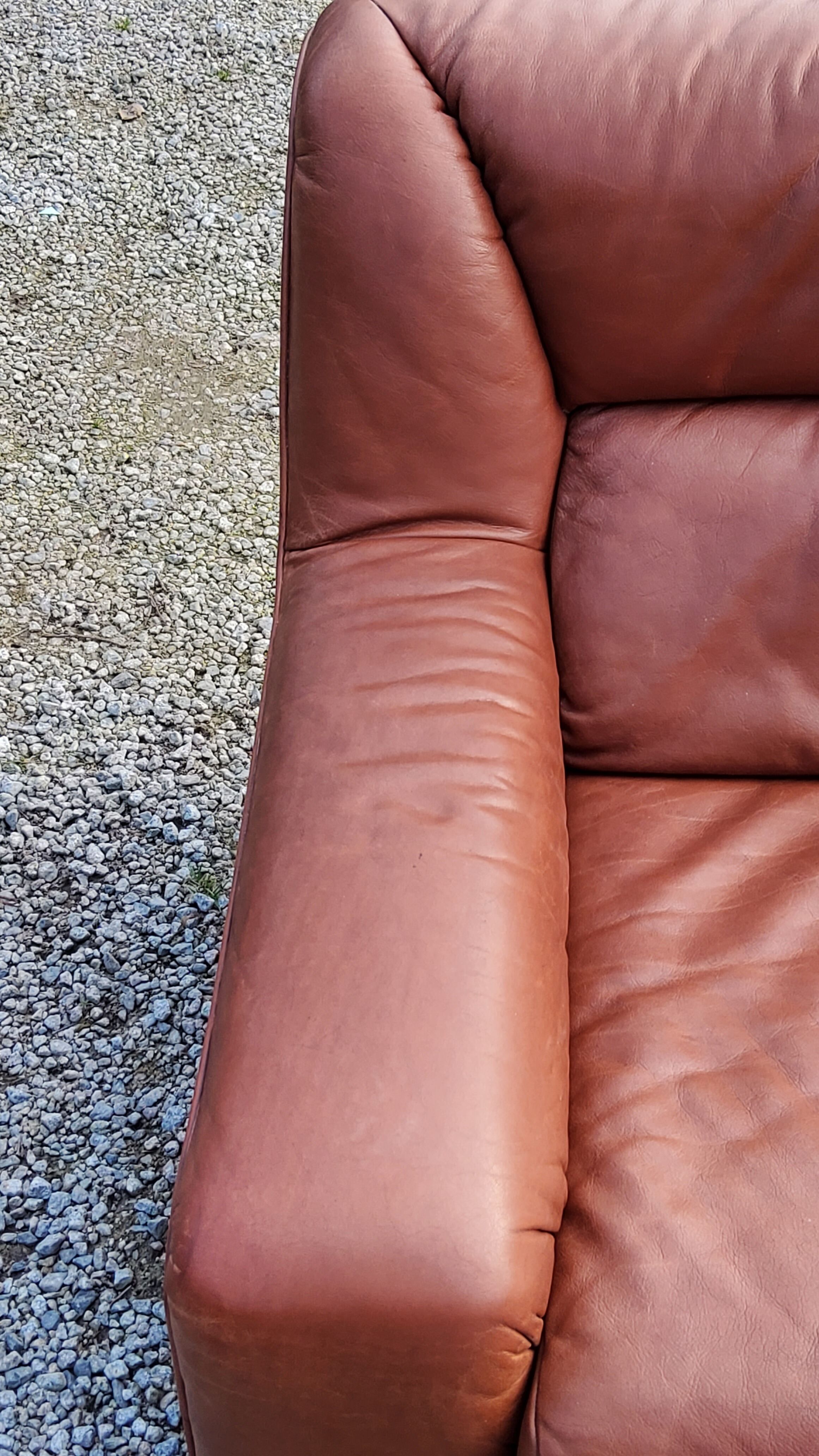 Pair of armchairs and De Sede sofa in cognac leather from the 70s/80s