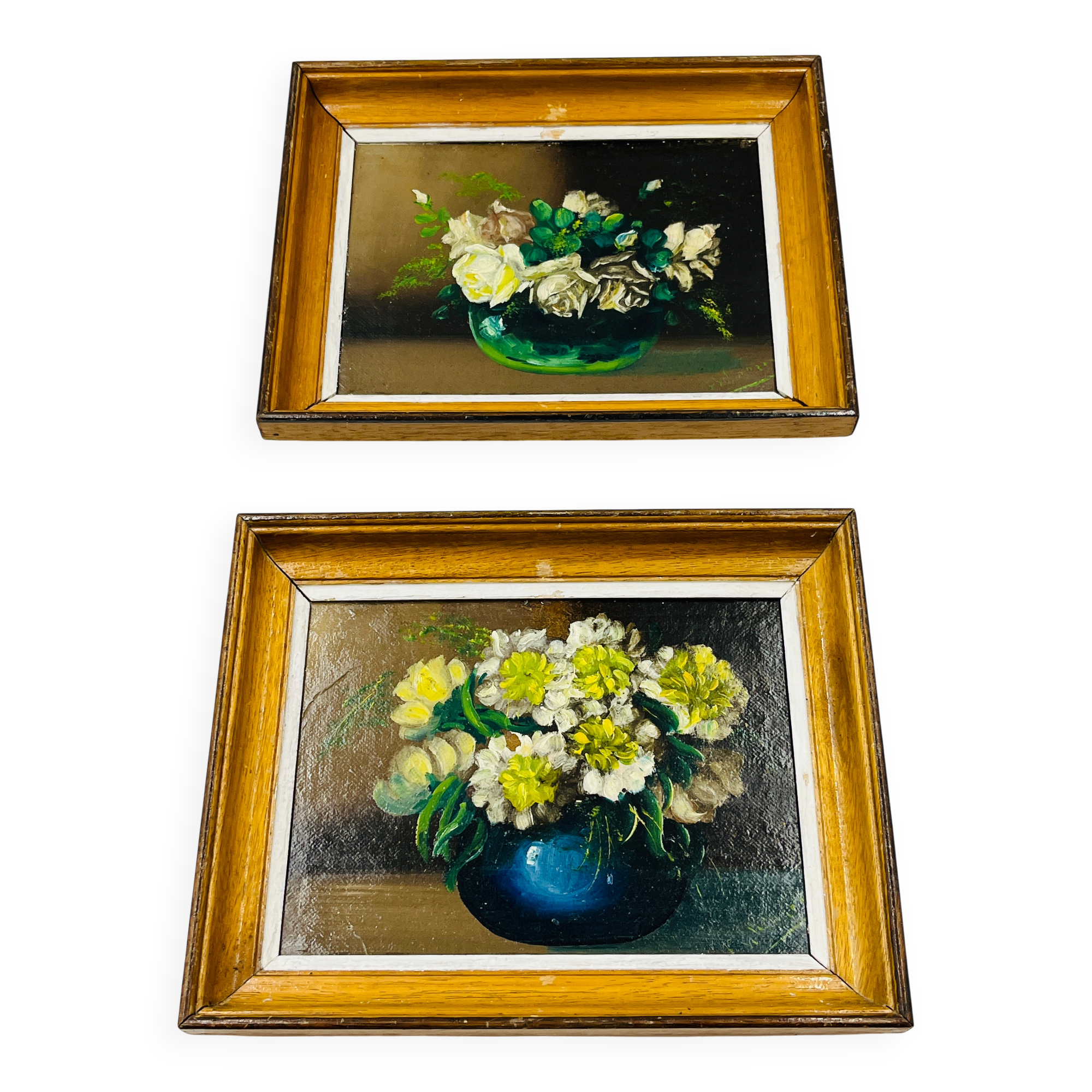 Pair of small framed vintage floral oils