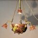 Bronze three-armed chandelier with a grape decoration.