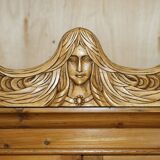 Vintage hand-carved wardrobe in Art Nouveau style.
