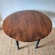 Round table with flaps