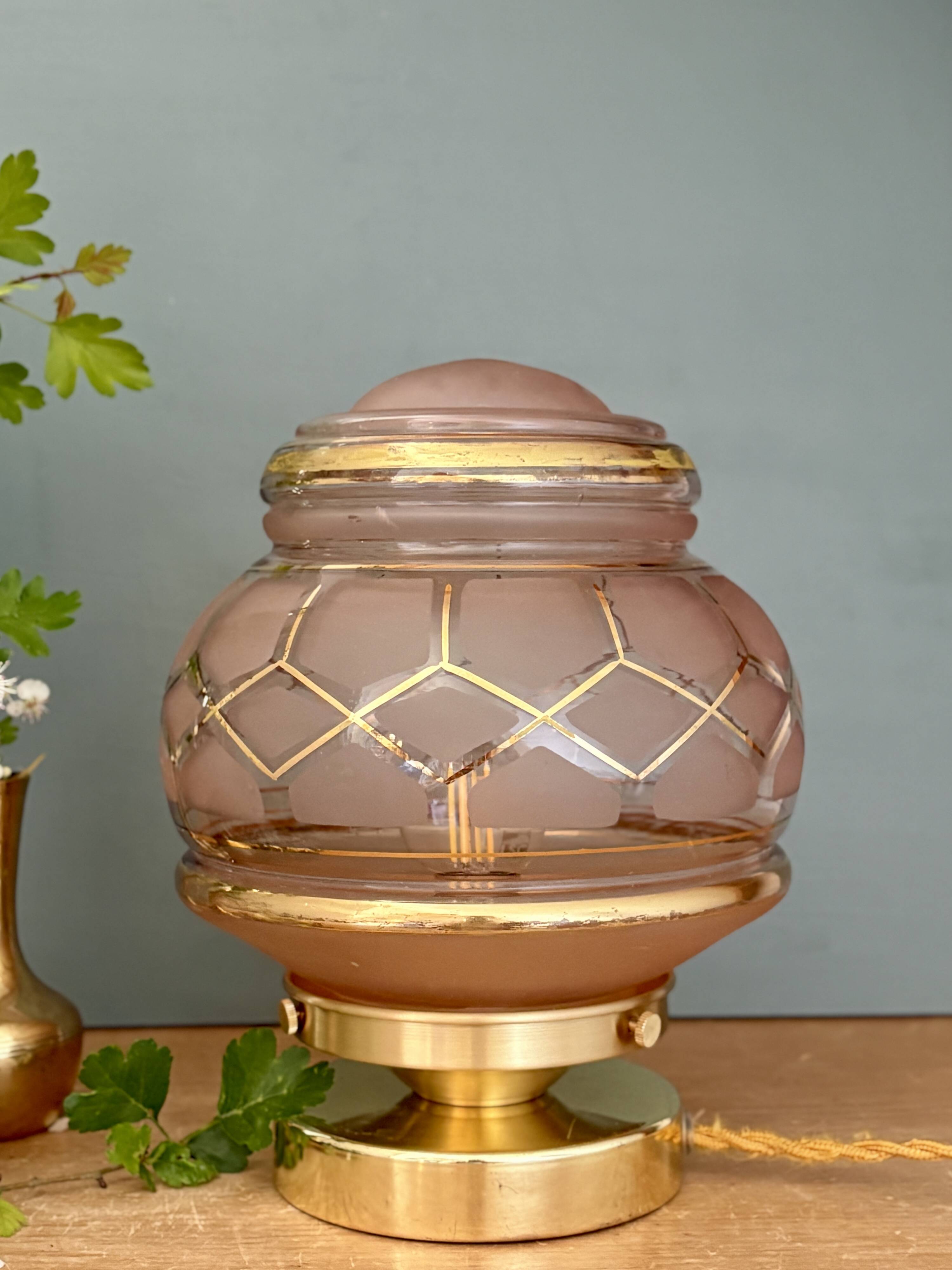 Vintage Art Deco globe table lamp in pink and gold glass.