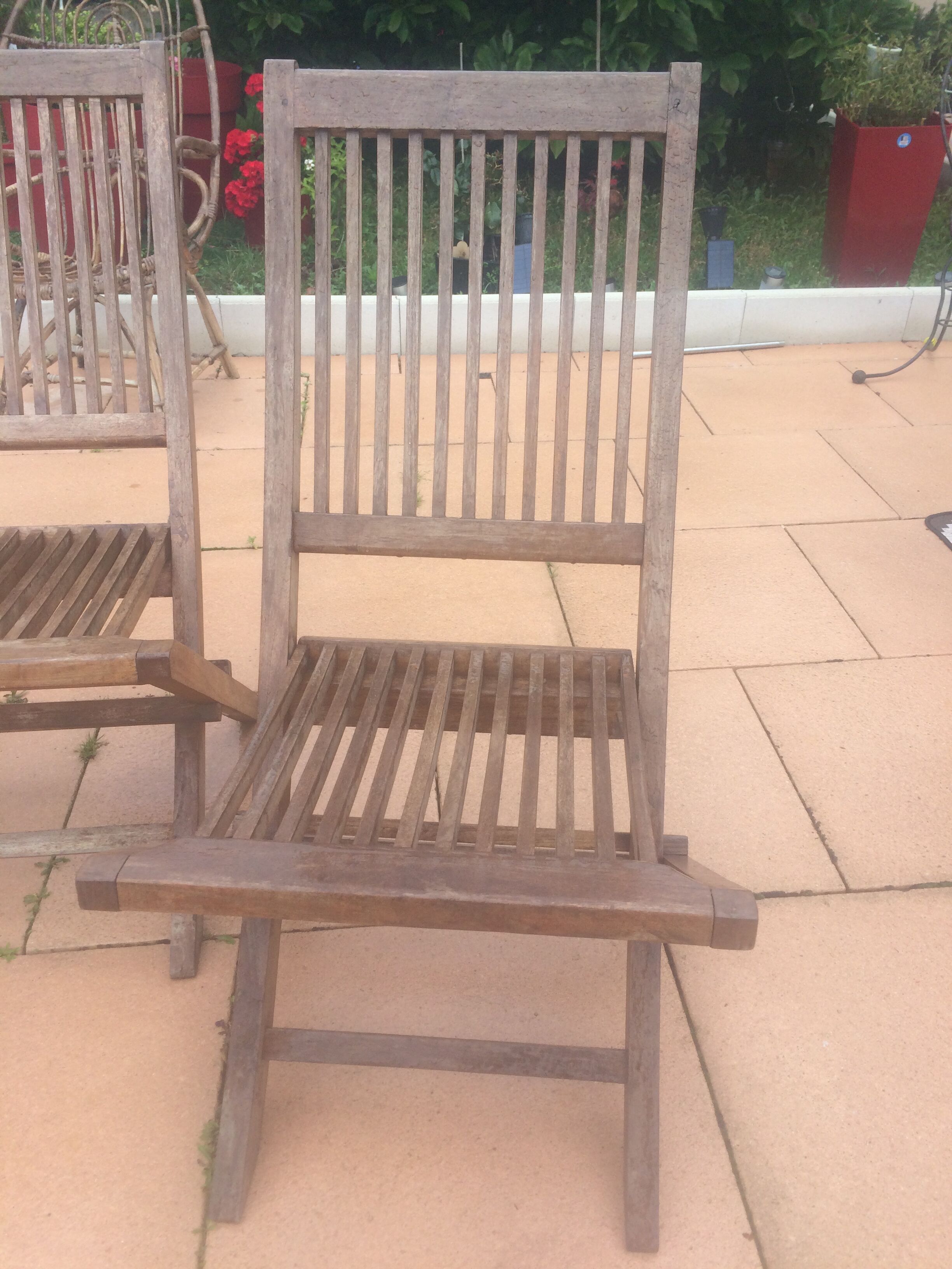 2 old teak chairs. Brand plate.