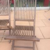 2 old teak chairs. Brand plate.