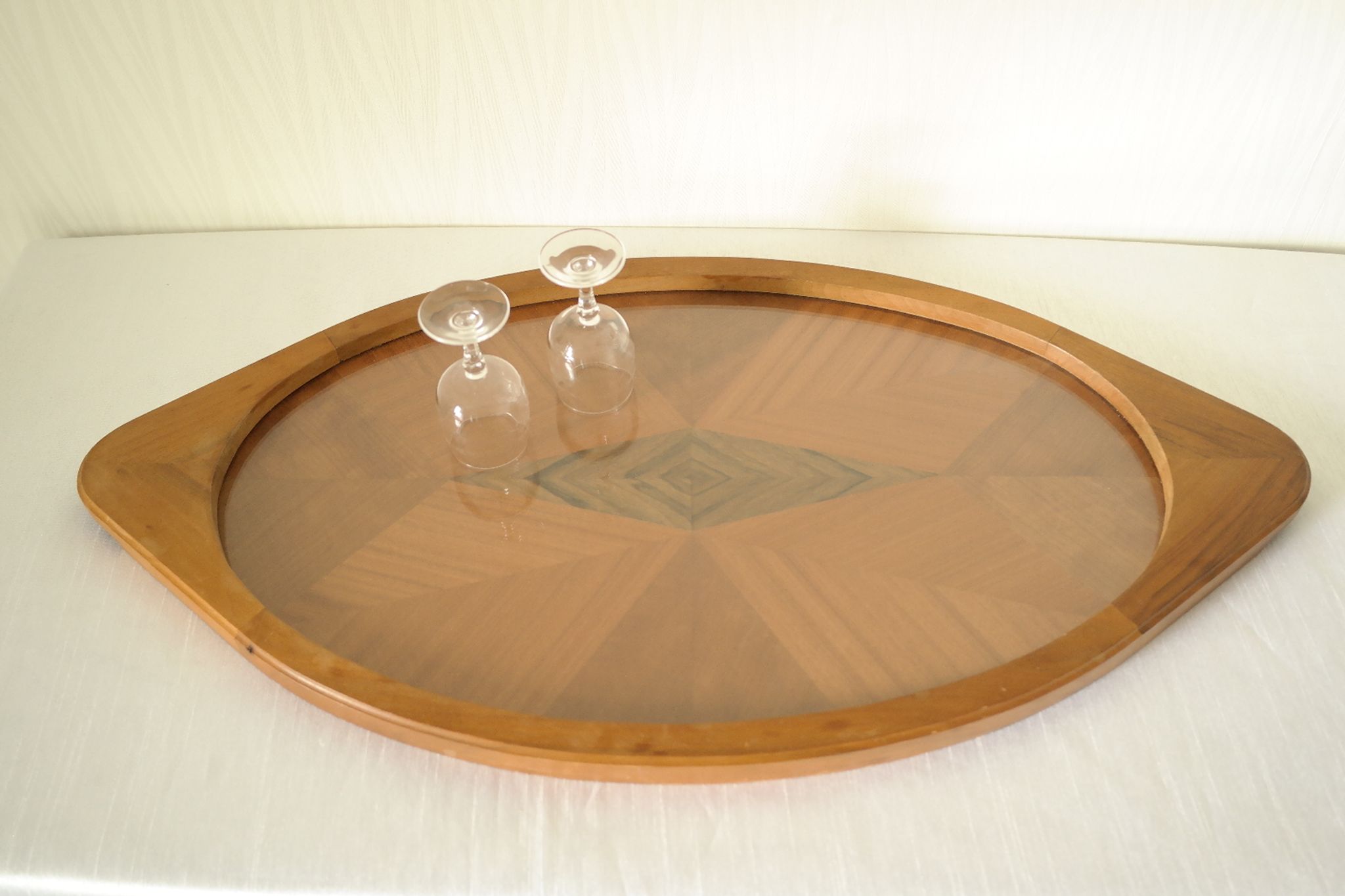 Oval wooden tray with glass and artisanal marquetry from the 70s.